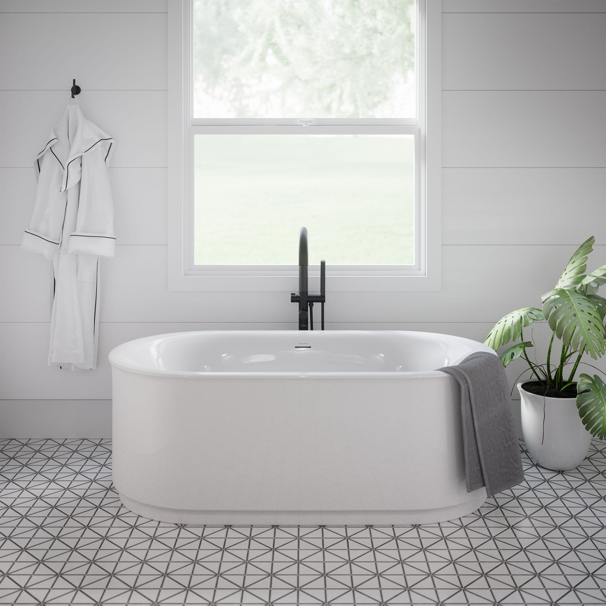 Studio® S 68 x 34-Inch Freestanding Bathtub Center Drain With Integrated Overflow